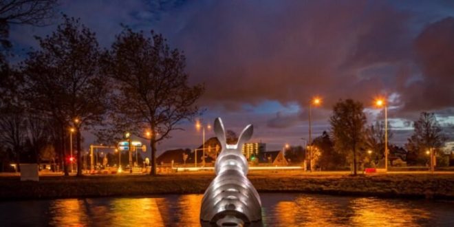 Glowing rabbit made of 3D-printed polycarbonate pops up in a Dutch pond
