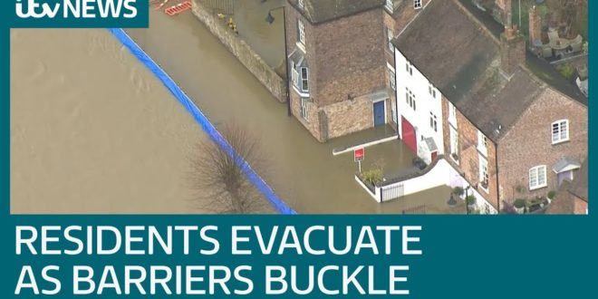 Emergency evacuation as flood barriers overwhelmed | ITV News
